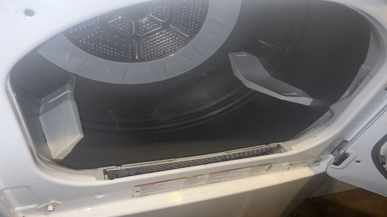 Trying to remove Lint Cover from Dryer to clean lint buildup