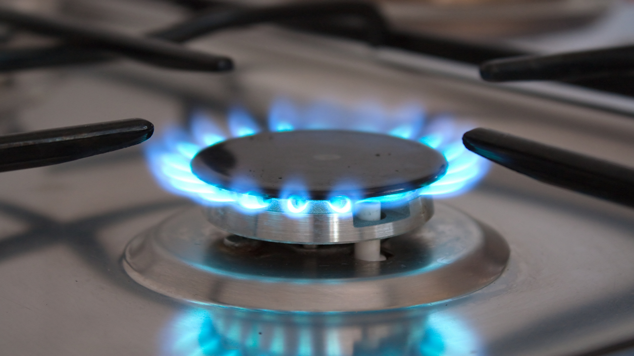 Does anyone make a range with half induction and half gas burners?